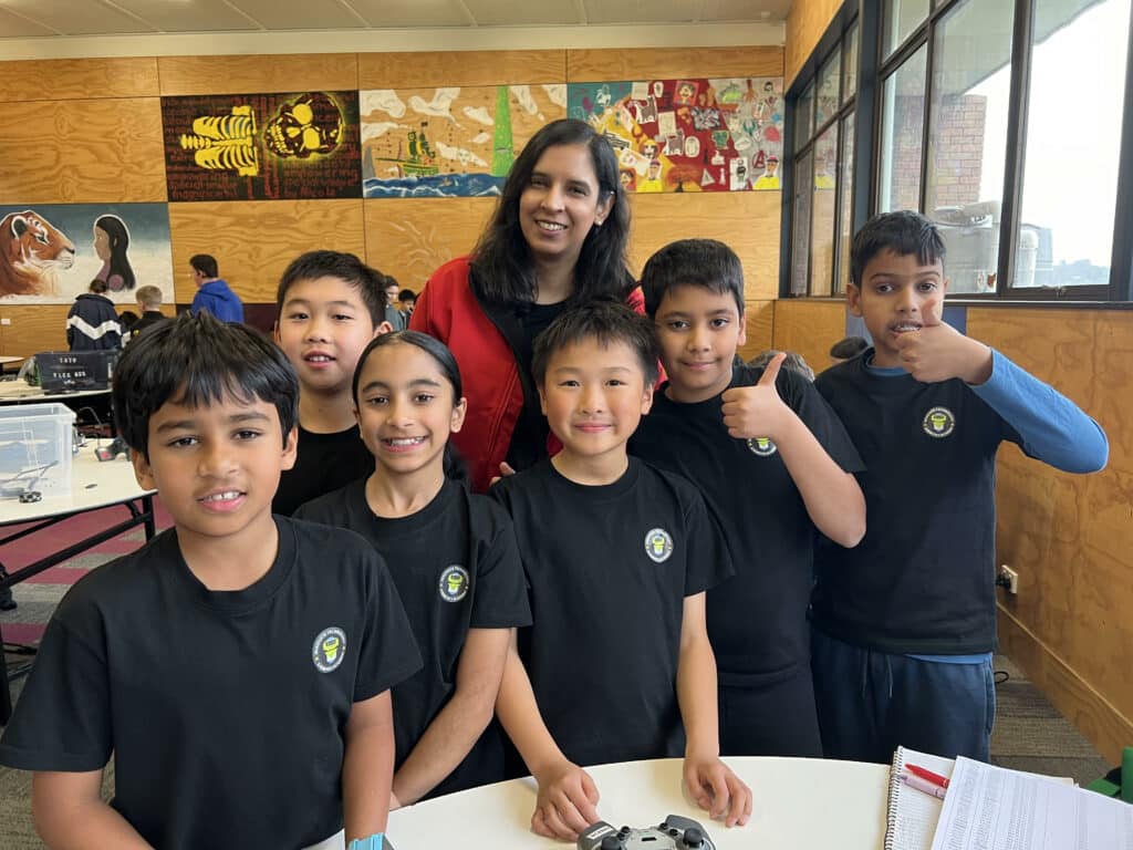 Students and mentors at a robotics competition event
